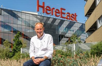 Gavin Poole sat outside Here East