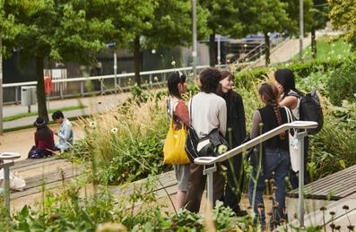 A group of people on Queen Elizabeth Olympic Park