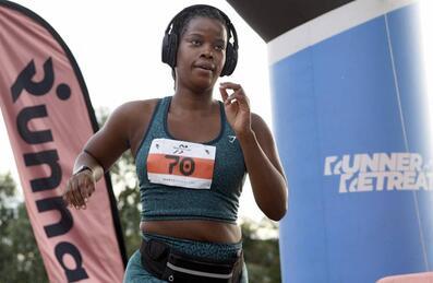 A runner takes part in a RunThrough event on Queen Elizabeth Olympic Park
