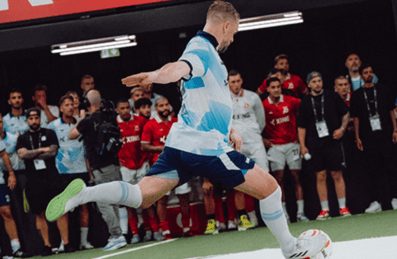 A player shoots at Baller League