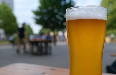 A beer glass outside on a table