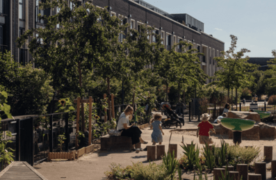 Children enjoying a neighbourhood playground on a sunny day