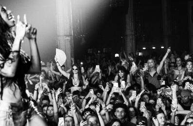Musician on stage with a big audience