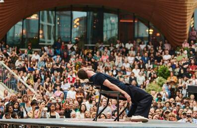 A photo of a performance at Dancing City festival on Queen Elizabeth Olympic Park in London