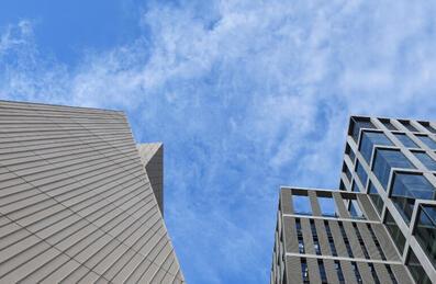 A shot from the ground of high buildings at East Bank