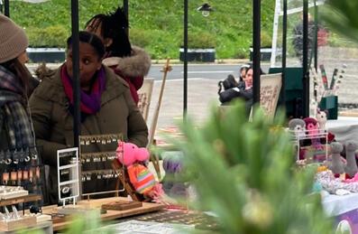 Two market stalls at Hackney Bridge Christmas market