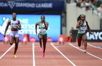 Five runners sprint for the finish line at London Stadium