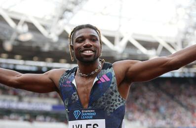 A male athlete celebrates