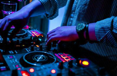 A DJ at a mixing desk