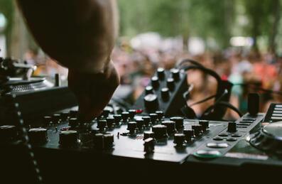 A DJ plays to a crowd