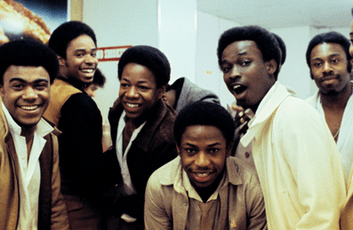 A photo from the 1970s showing a group of young Black men smiling