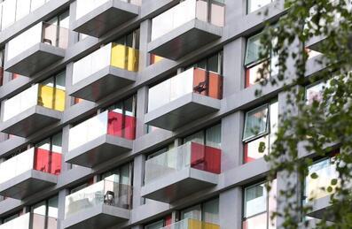 multi-coloured balconies of modern flats