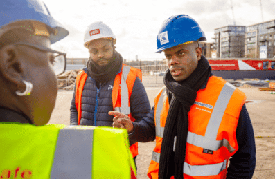 Construction workers talking at Build East