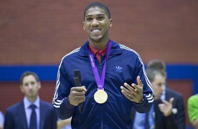 Anthony Joshua with a medal