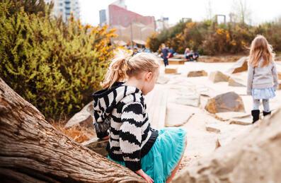 child plays in playground