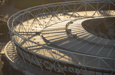 An aerial image of London Stadium taken at sunrise