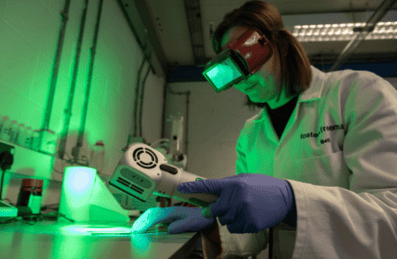 Photo of a person working in a lab