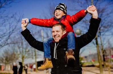 Boy on man's shoulders
