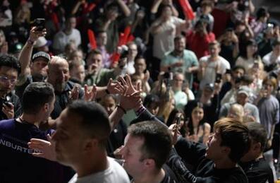 A crowd of people cheering for esports champions at Copper Box Arena
