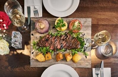 steak and potatoes with white wine