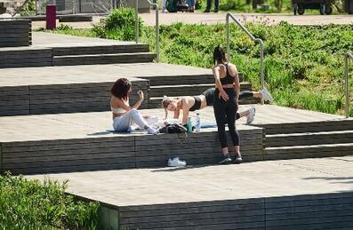 Three women exercising outdoors